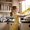 little girl empties the kitchen to wash everything