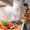 Woman cooking at kitchen