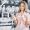 Woman examines various items of dishes. Beautiful woman shopping tableware in supermarket