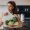 young-sporty-woman-with-scales-vegetables-kitchen